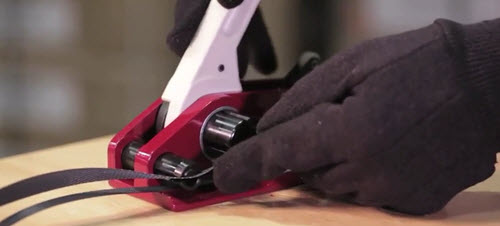 wrapping the strap around the package